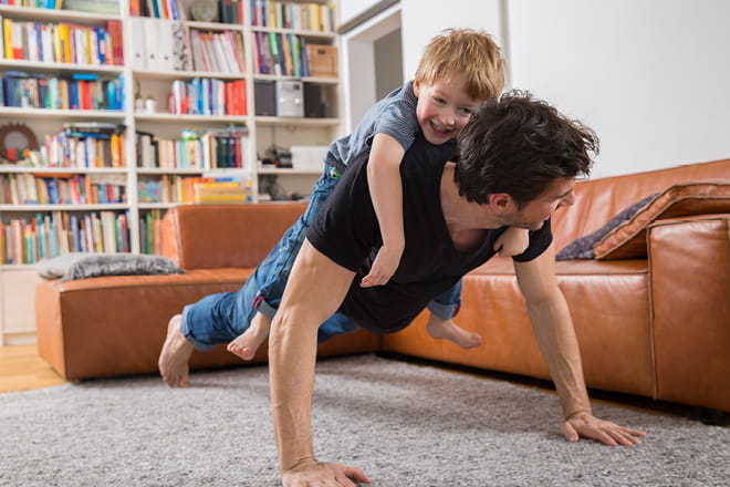 Father and son doing push-ups