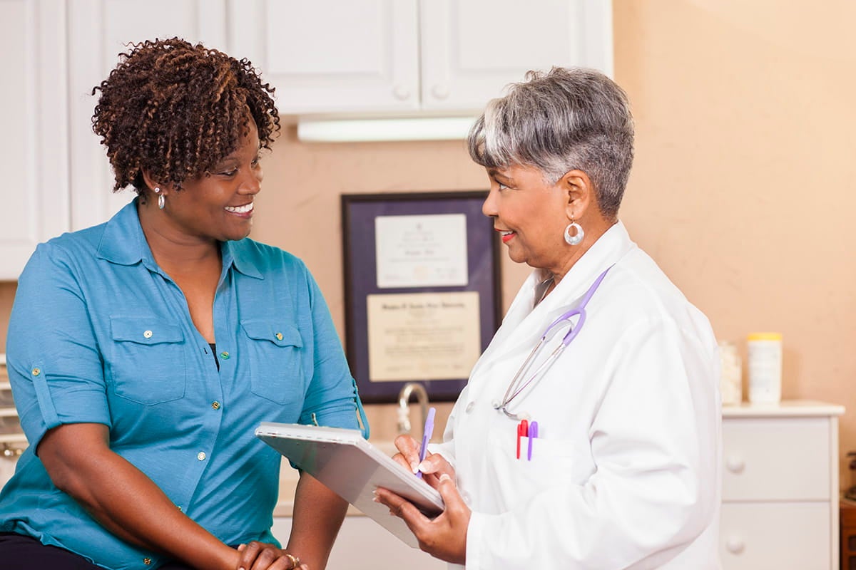 Nurse talking to a patient