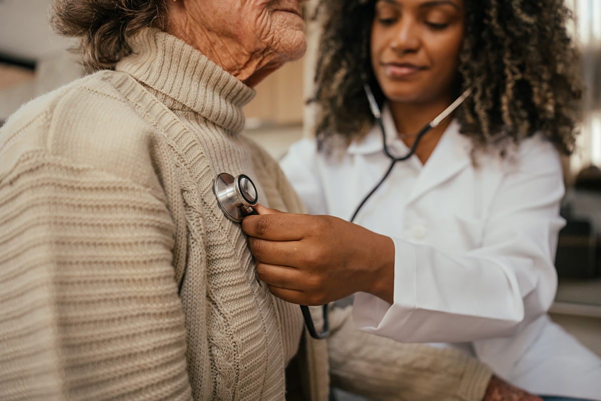 A cardiologist listens to a patient’s heart at Ascension Wisconsin in Wisconsin.