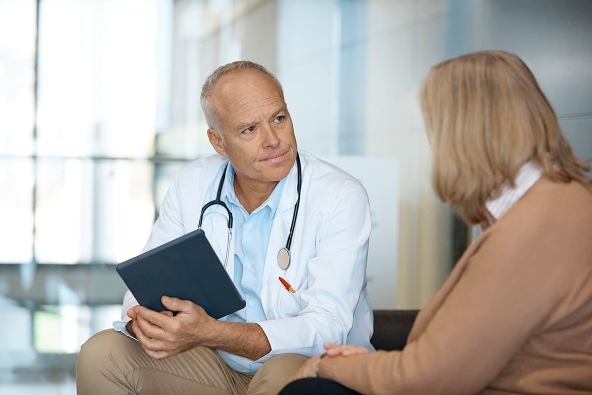 Doctor meeting with a patient.
