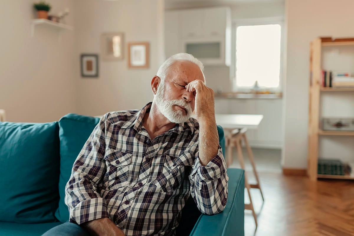 A man struggles with a severe headache in Waco, Texas.