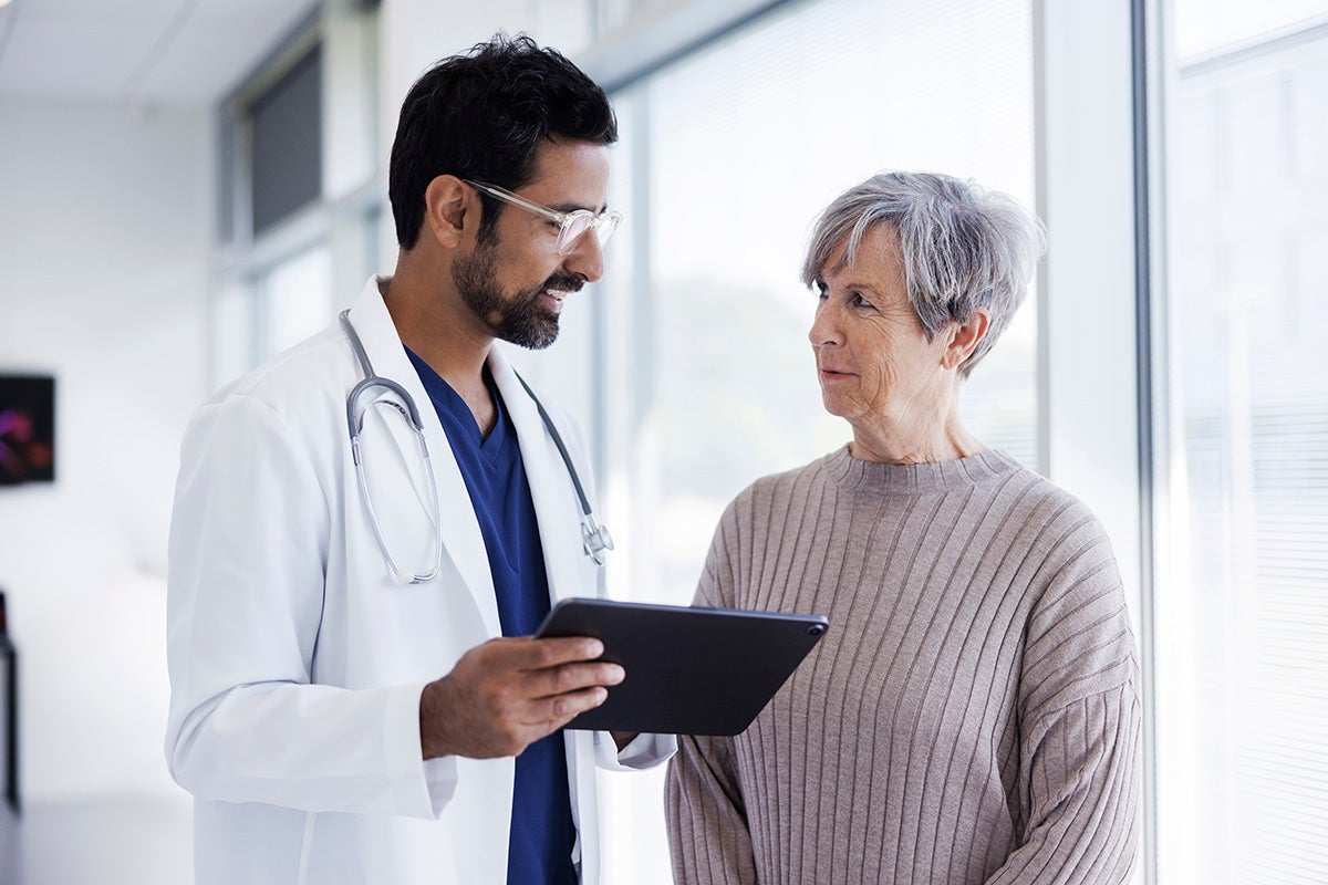 Neurologist talking with a patient