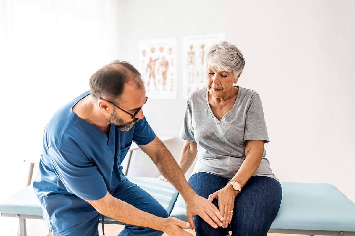 Woman receives care from her orthopedic doctor at Ascension Texas.
