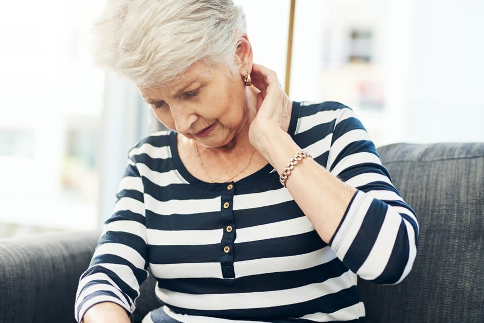 Woman with neck pain.