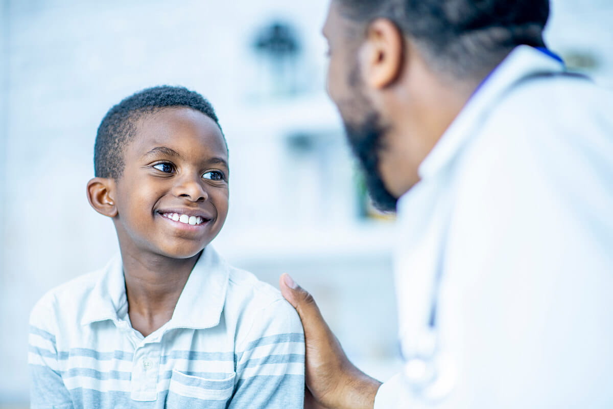 Young boy with doctor.