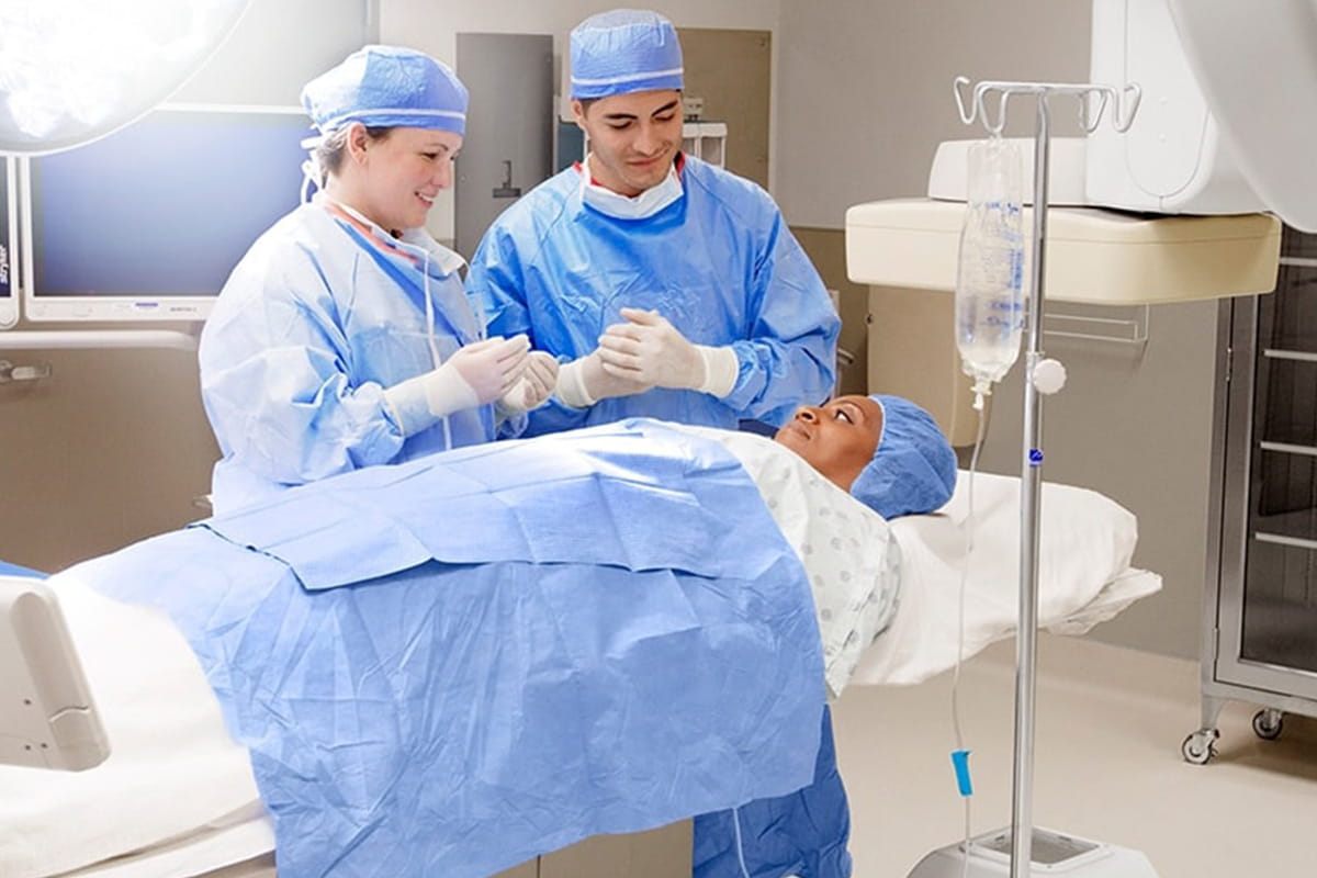 Surgeons talking with patient before surgery