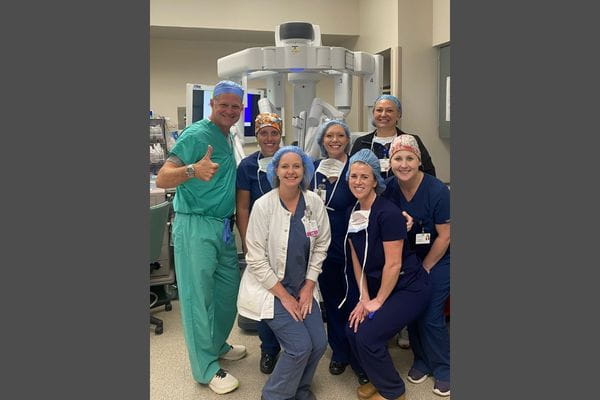Ascension Providence outpatient surgical team poses with the hospital’s new state-of-the-art da Vinci Xi surgical robot.