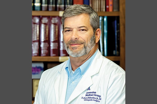 Dr. Jean Dabezies, an orthopedic joint replacement surgeon with Ascension Sacred Heart in Pensacola, Florida