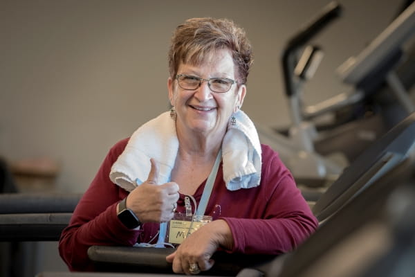 Ascension Illinois TAVR patient Maureen Vlcek gives thumbs up after physical therapy session