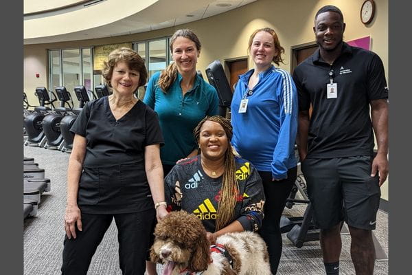 Ascension St. Vincent’s One Nineteen associates partnering with Nicole Gettridege in the diabetes management program. Pictured: Donna Sibley, RD; Chelsea Henderson, member navigator; patient Nicole Gettridge with service dog SheRa Adora; Sara McDaniel, Medical Fitness program coordinator; Damian DeYampart, personal trainer