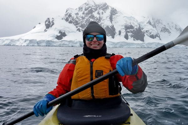 Breast cancer survivor Colleen Ochab kayaks off the coast of Orne Harbor in Antarctica