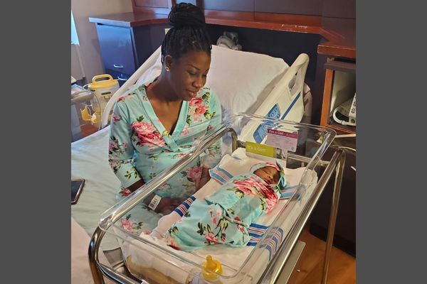 newborn baby girl in hospital with mom