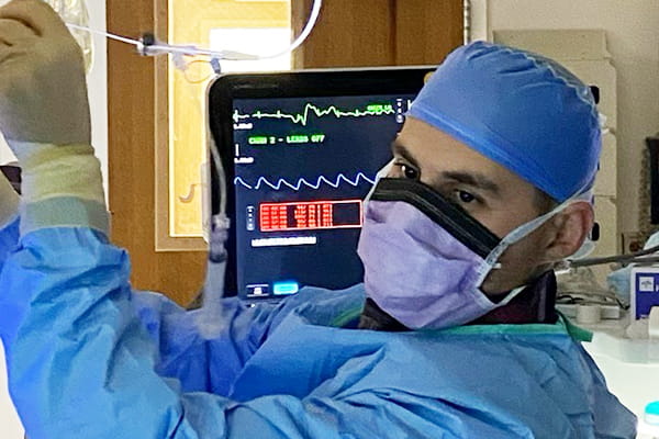 Abdel-Ghanie Abu-Samra, MD, performing a procedure for the Lung Nodule Clinic