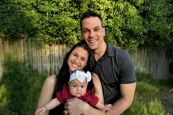 Heather, husband, and baby