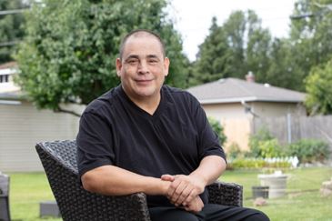 Man sitting in chair  who received robotic colon surgery at Ascension Resurrection in Chicago