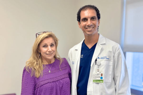 Angela, patient at Ascension St. Vincent&#39;s Cardiology Riverside standing next to Dr. Amr Barakat