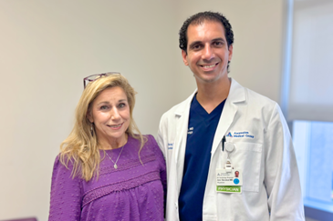 Angela, patient at Ascension St. Vincent's Cardiology Riverside standing next to Dr. Amr Barakat