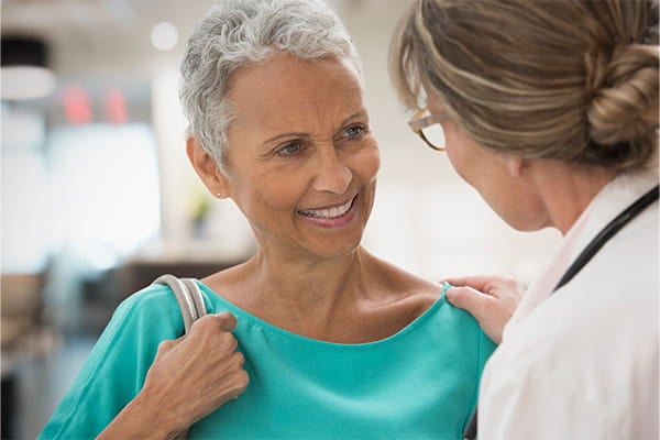 A patient and a physician is having a conversation.