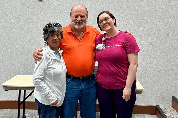 Bruce with his wife (left) and nurse Karma (right)