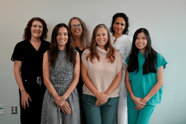 All six urology providers standing together.