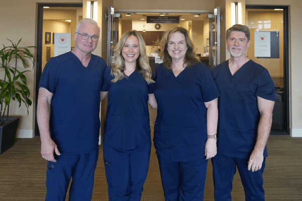 Four family medicine clinicians from the same family standing together at Ascension Medical Group Providence at Sanger in Waco, Texas.