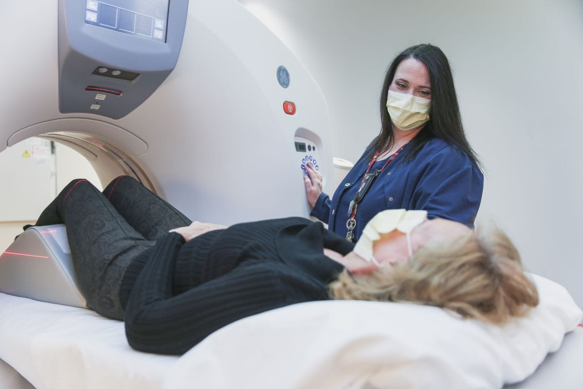 Woman receives care from her orthopedic doctor at Ascension Providence.