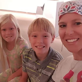 Amanda Hudson, breast cancer patient at Ascension Via Christi Cancer Center Wellness Program, pictured with her children during treatment. 