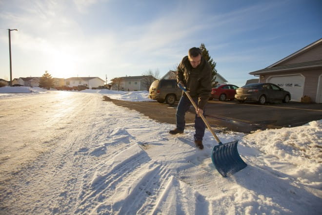 Shoveling snow during Wisconsin's snow season