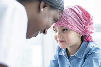 Doctor talking to a child.