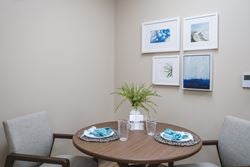 Comfortable dining area where patients and family members can practice meal preparation, dining skills, and everyday routines during rehabilitation.