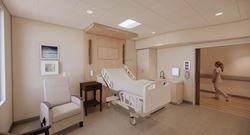 Private patient room at Ascension Sacred Heart - Inpatient Rehabilitation Facility with hospital bed and chair.