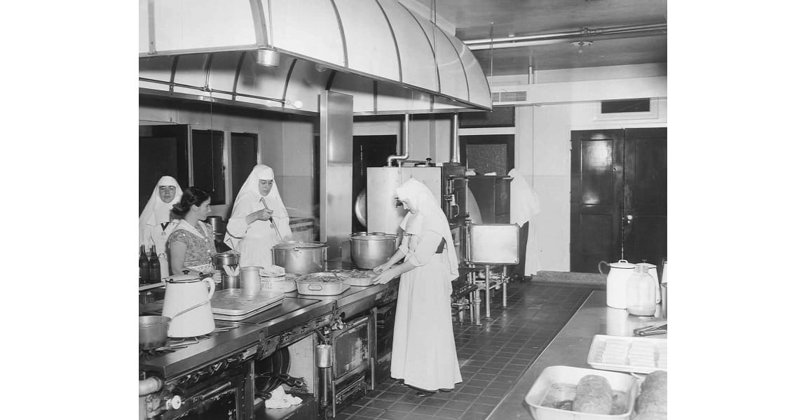 Sister's of the Sorrowful Mother in the kitchen cooking meals for patients at St. John Medical Center