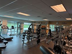 Interior view of the Ascension Saint Thomas Rutherford Wellness Center featuring strength training equipment, free weights, treadmills, and personalized fitness spaces designed to support cardiac rehabilitation, pulmonary rehabilitation, and wellness programs.