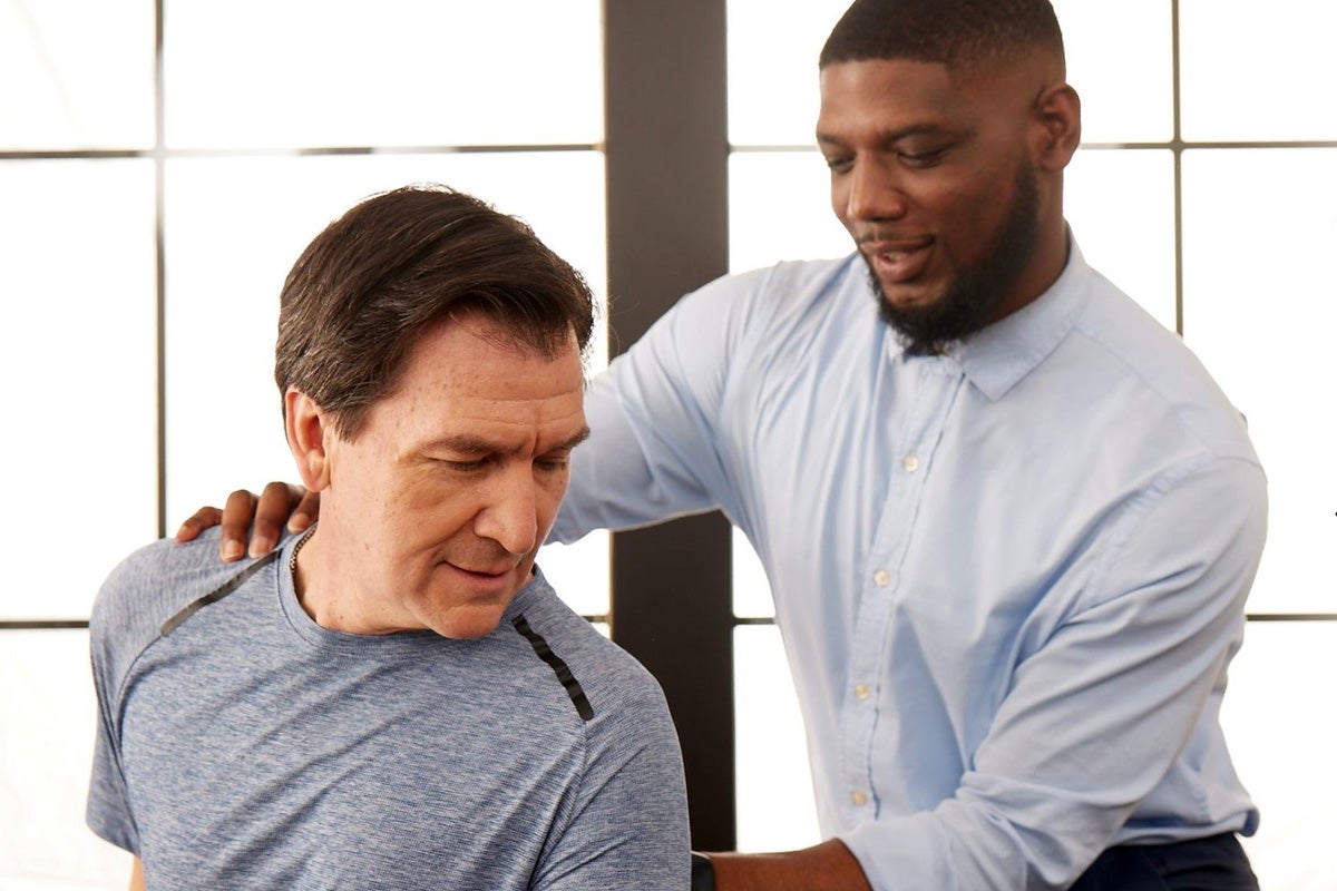 Physical therapist working with a patient