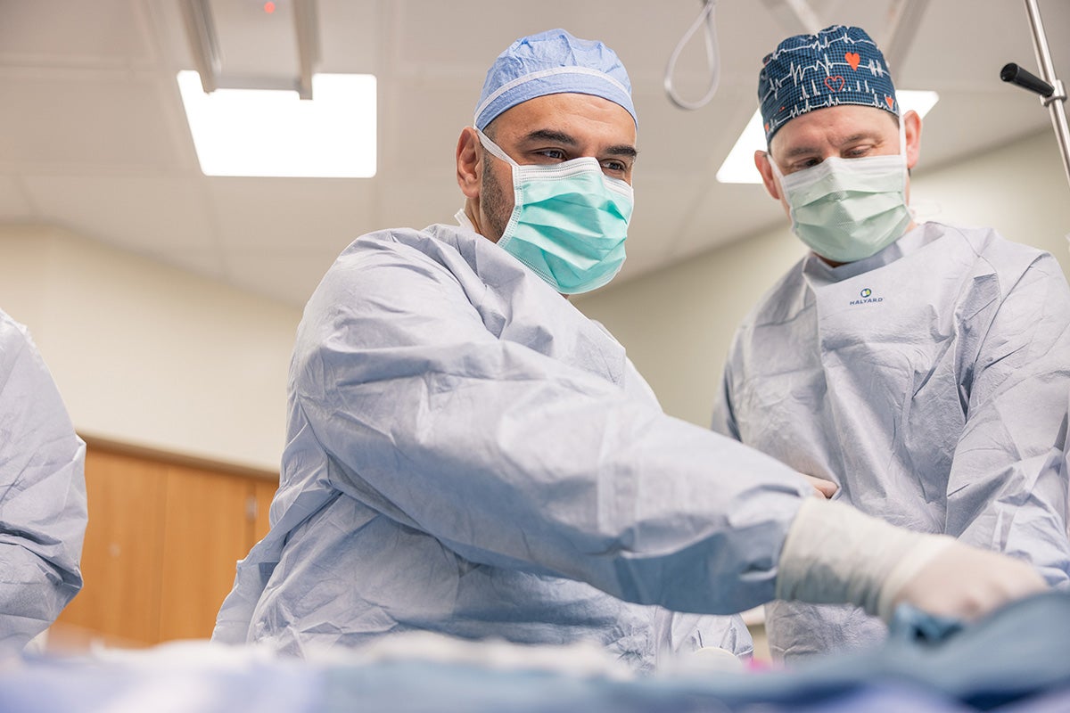 Muhammad Azzouz, MD and Wilson Clements, MD in the operating room