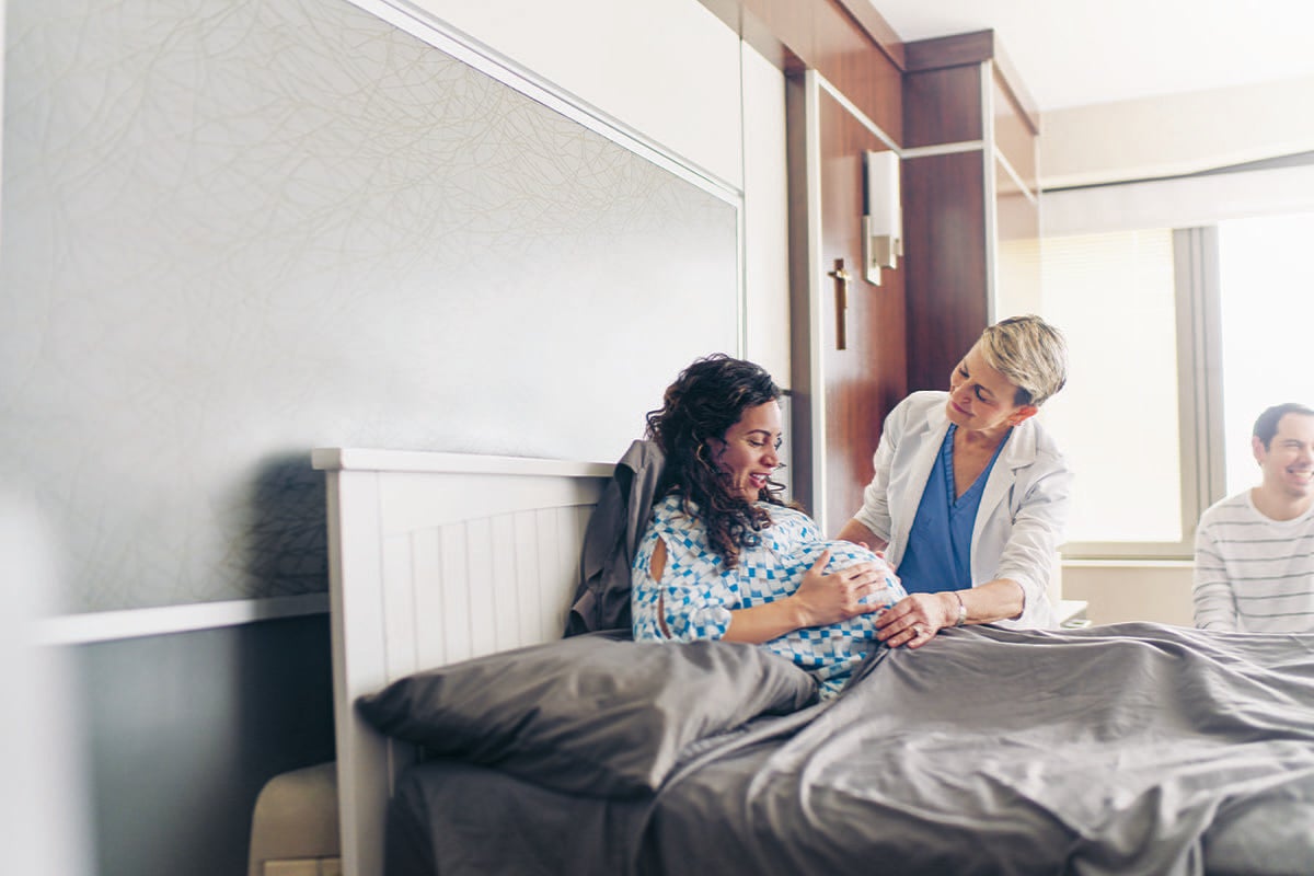 Dr. Schlechter talking with a patient.
