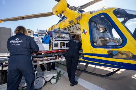Woman with cancer speaks with her doctor.