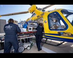 Woman with cancer speaks with her doctor.