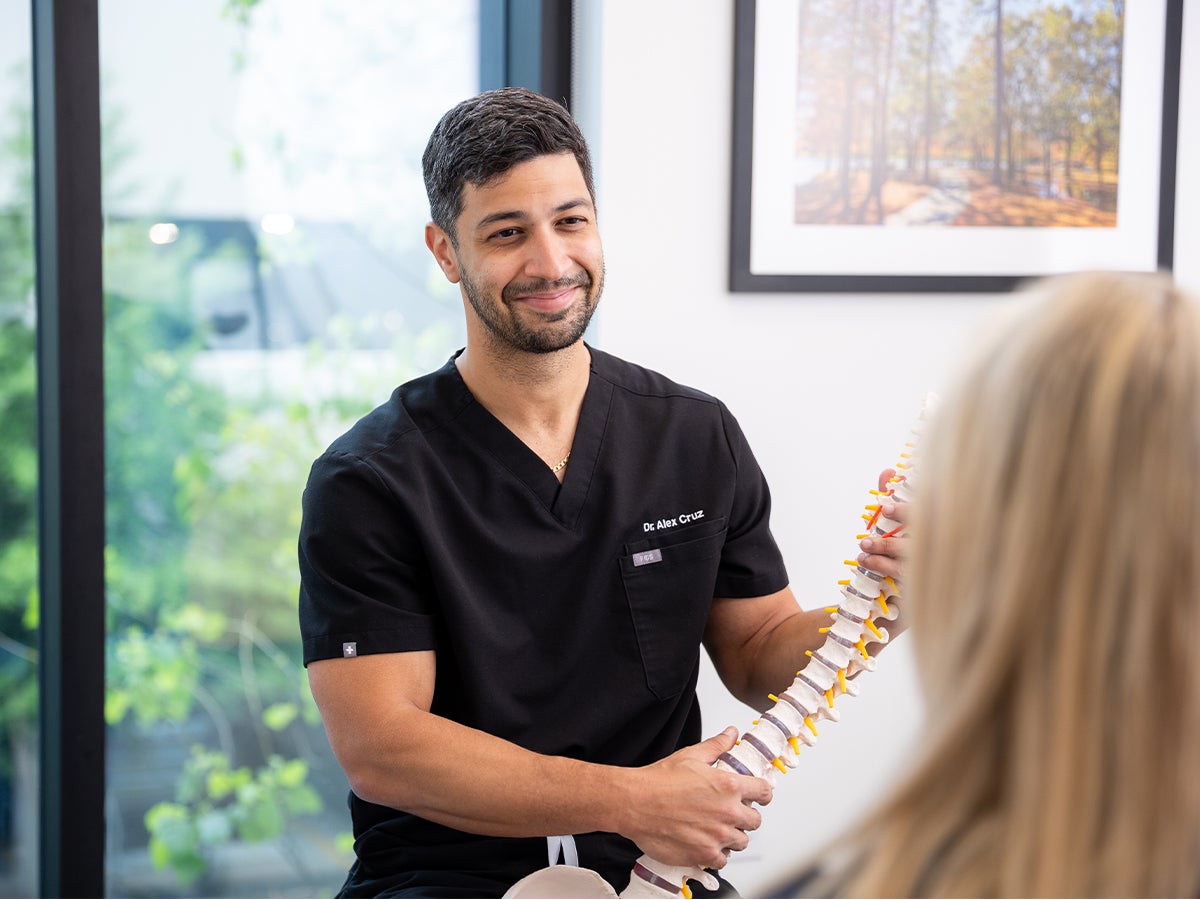 Man with back surgeon at Ascension Texas Spine & Scoliosis in Central Texas.