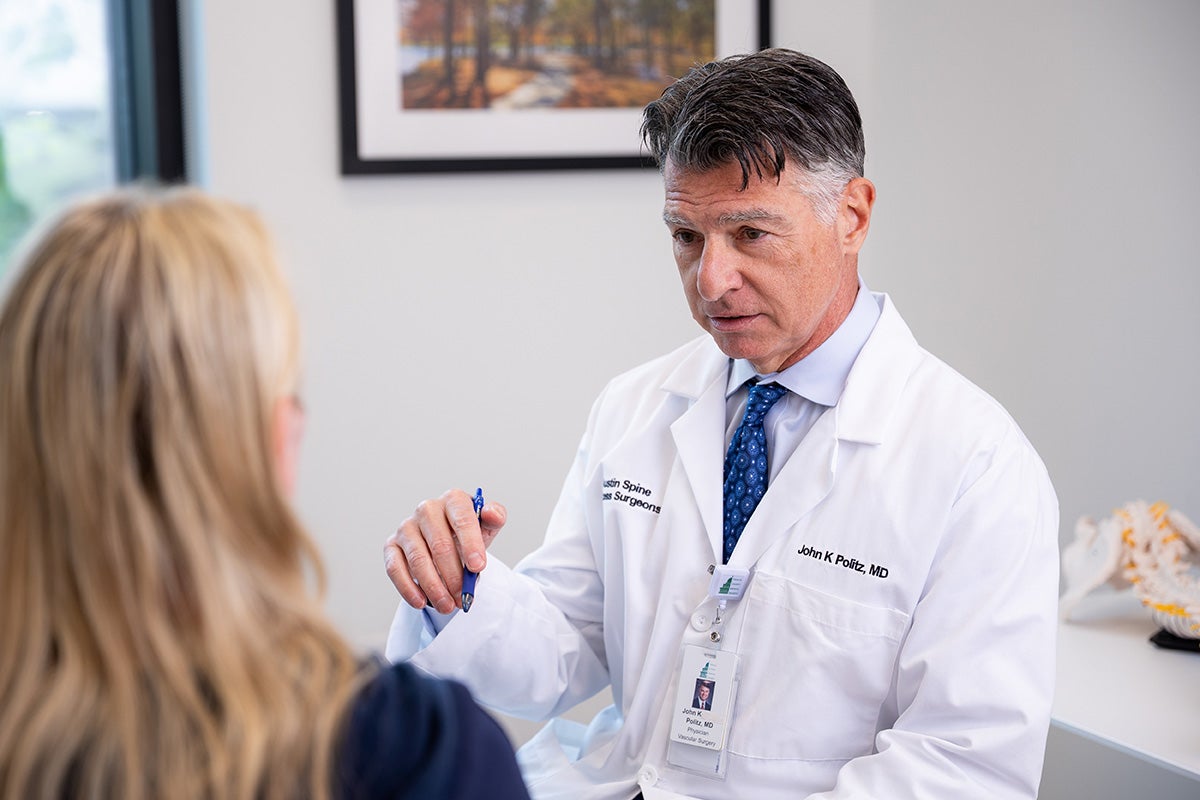 Dr. Politz explaining to a patient why ALIF may be right for them.