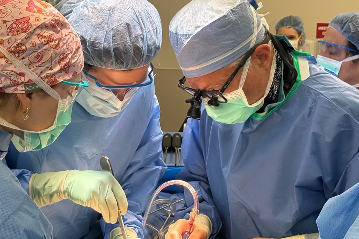 Dr. Politz and the surgical team performing an anterior lumbar interbody fusion (ALIF) procedure.