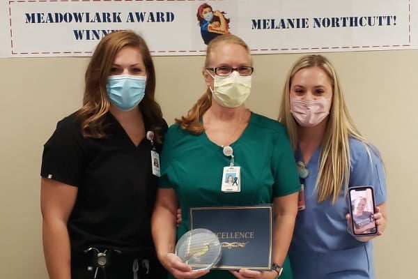 Melanie Thomas and three daughters