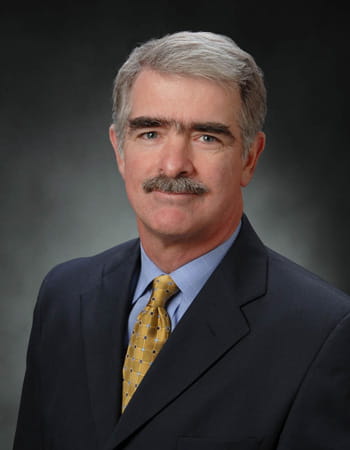 William E. Johnson, III, MD