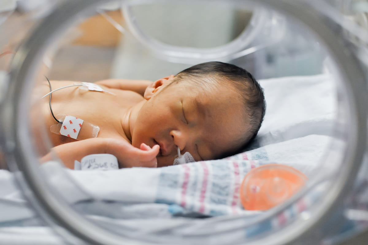 Newborn baby in the level four neonatal intensive care unit at Dell Children’s Medical Center in Austin, Texas.