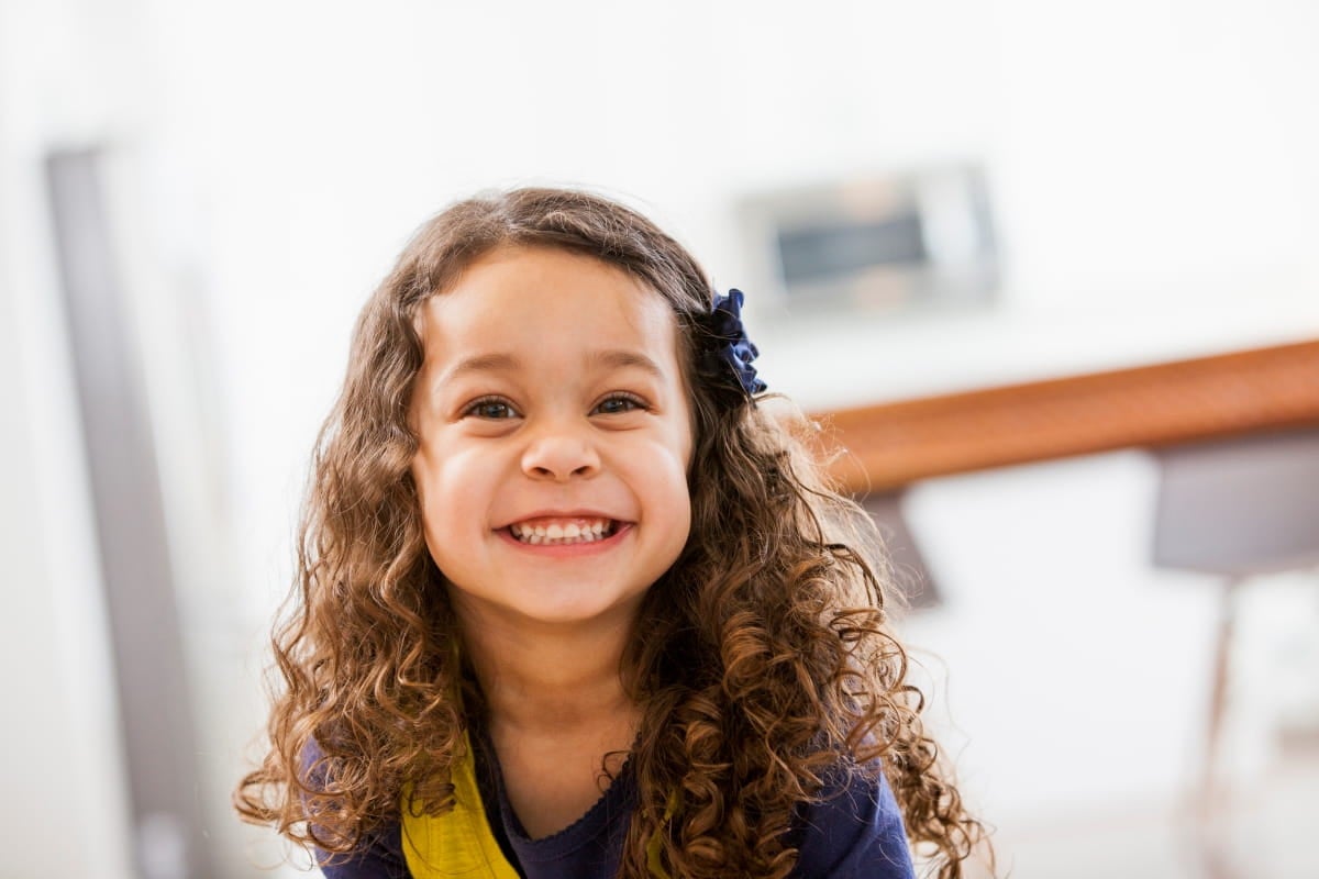little girl smiliing