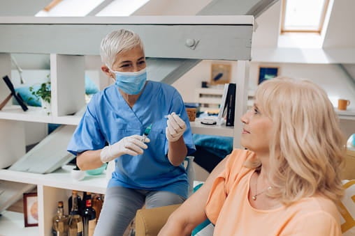 stock image of provider giving a vaccine