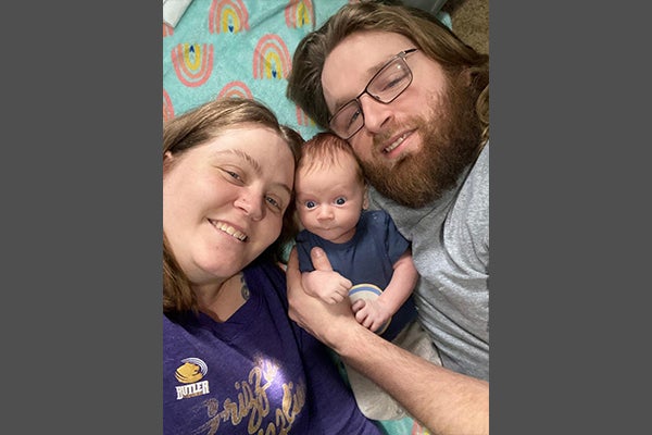 Jonnie and A.J. with new baby Elias