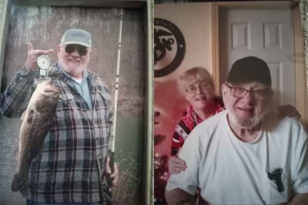 Thomas Moser holding a fish and posing with his wife