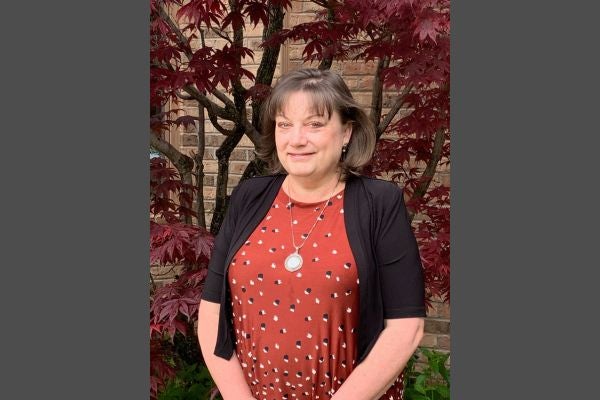 Beth Moberg-Wolff standing outside