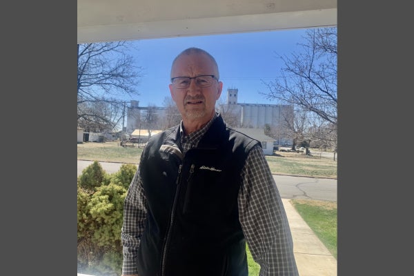 Martin Kershen, after recovering from his cardiac surgery and recovery, outside on his family farm